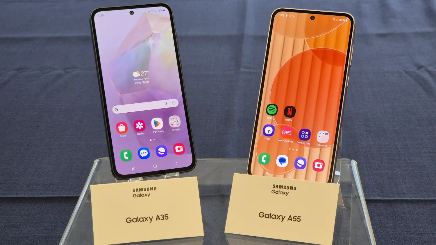 The new Galaxy A35 and A55 phones on stands with labels in front of them