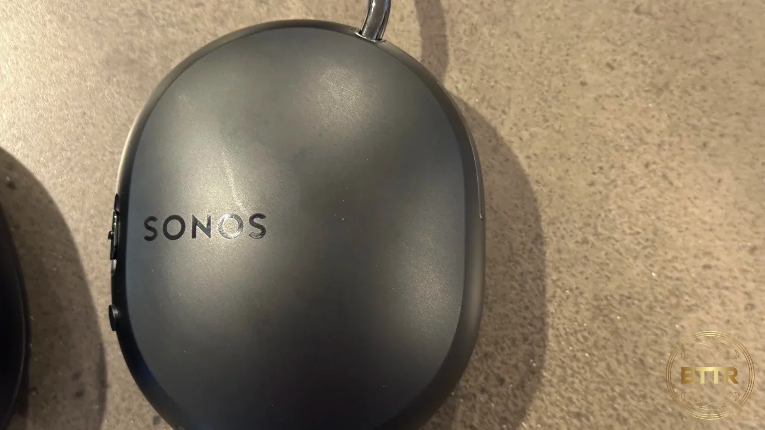 Close up of the Sonos logo on the Ace headphones