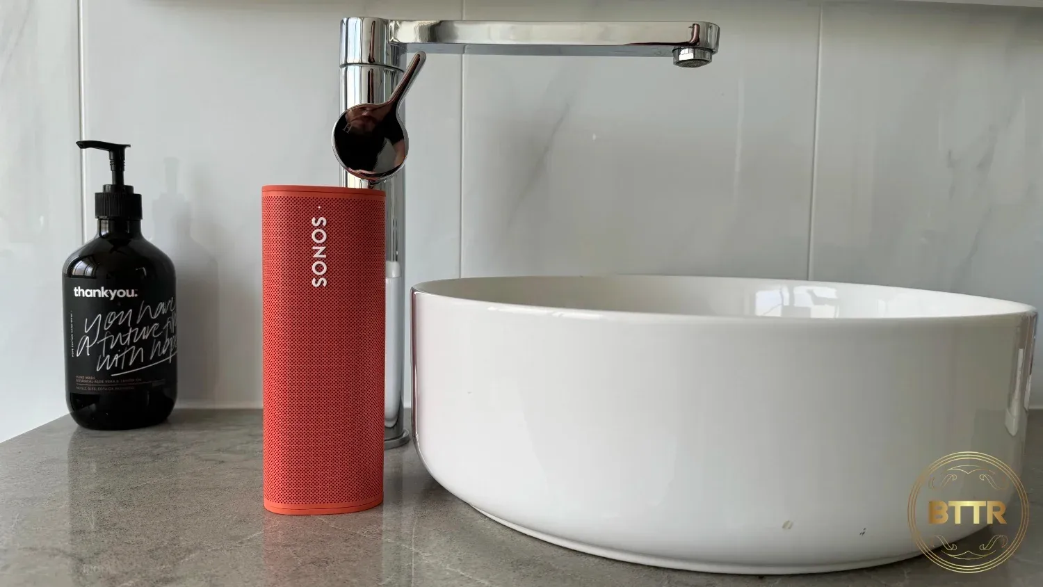 Sonos Roam next to a bathroom sink