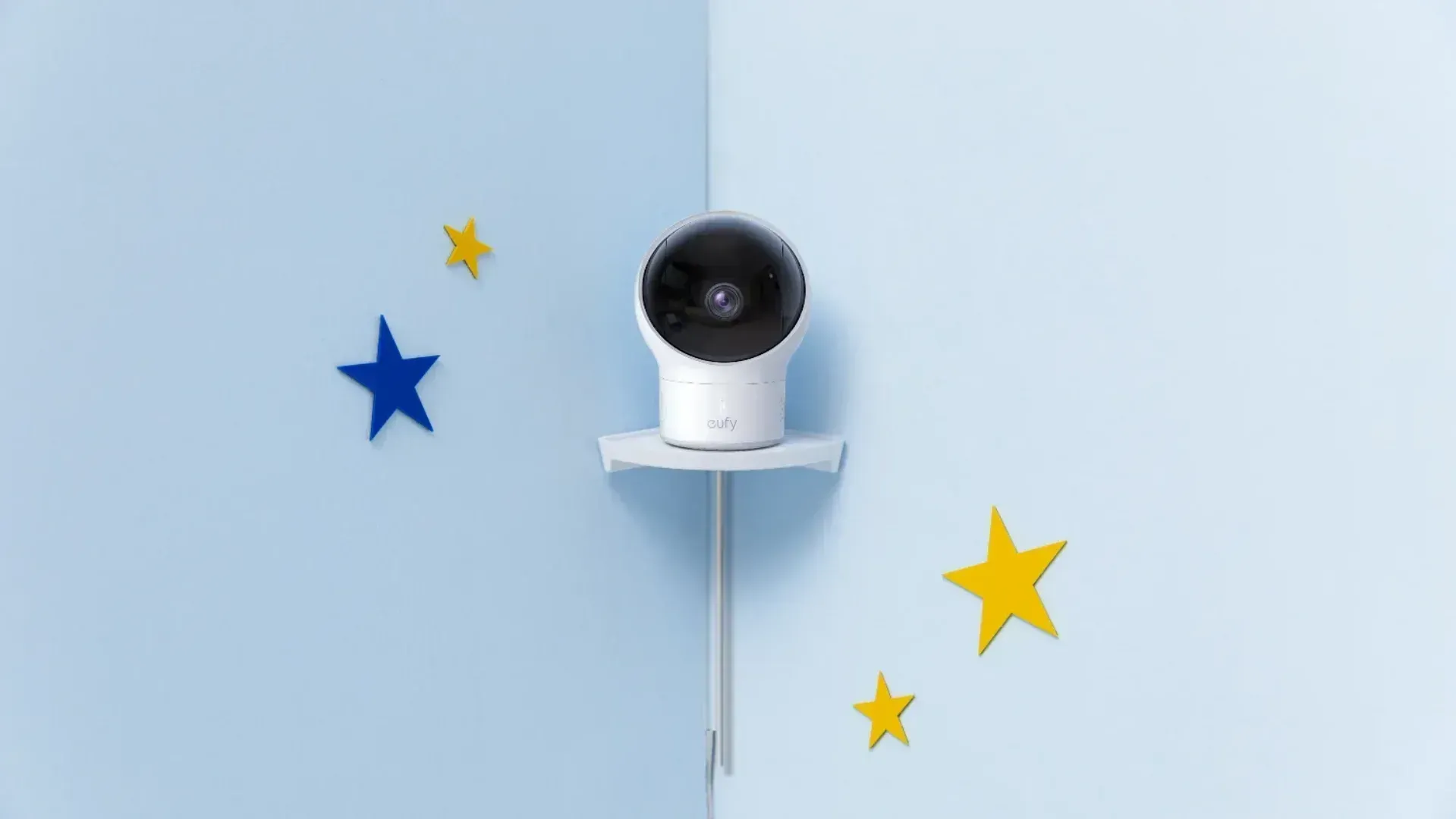 Eufy baby monitor in a blue bedroom