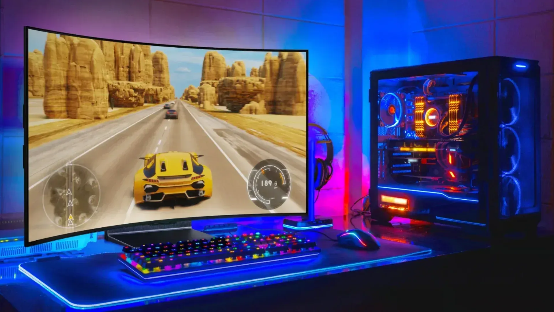 The LG OLED FLEX next to a gaming computer with RGB lighting