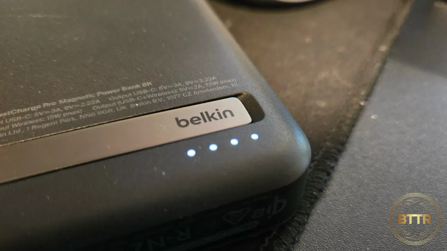 The charging lights on the power bank