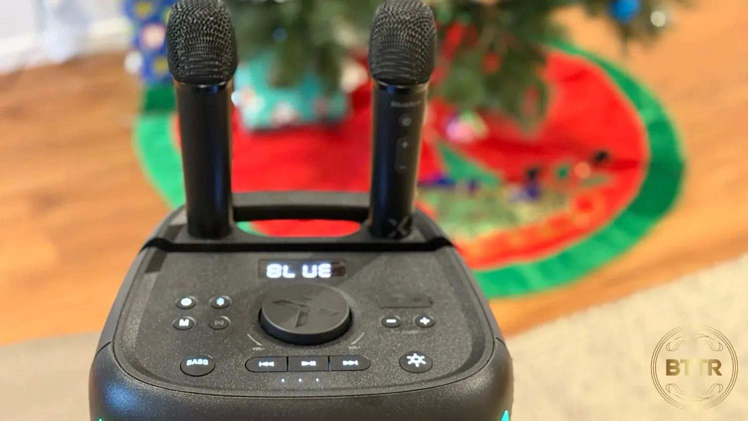 The controls on the top of the X5i, with the microphones in their slots