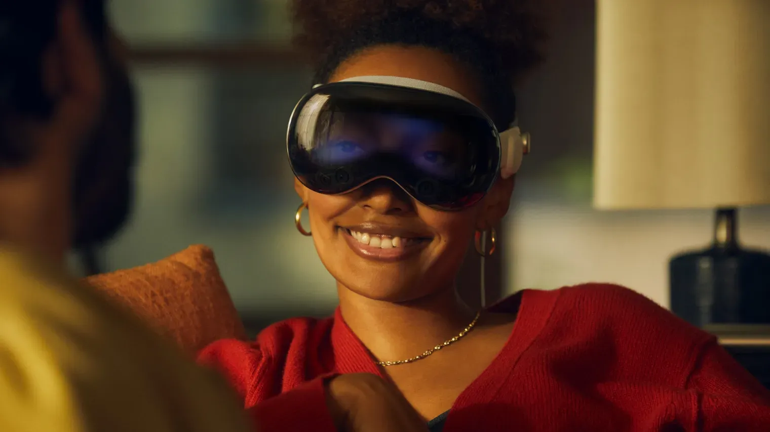 A woman wearing the Apple Vision Pro