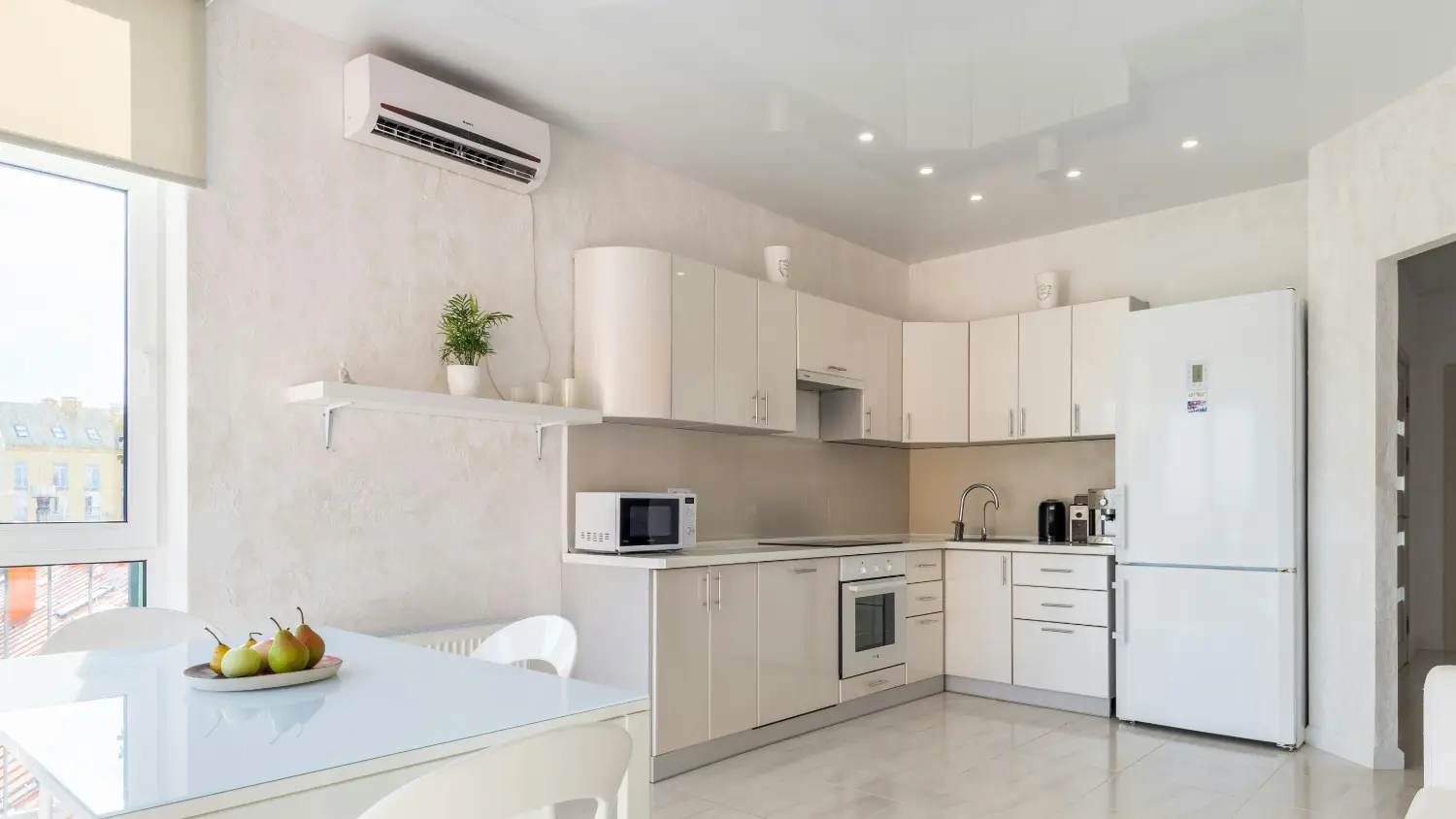 A kitchen full of white appliances