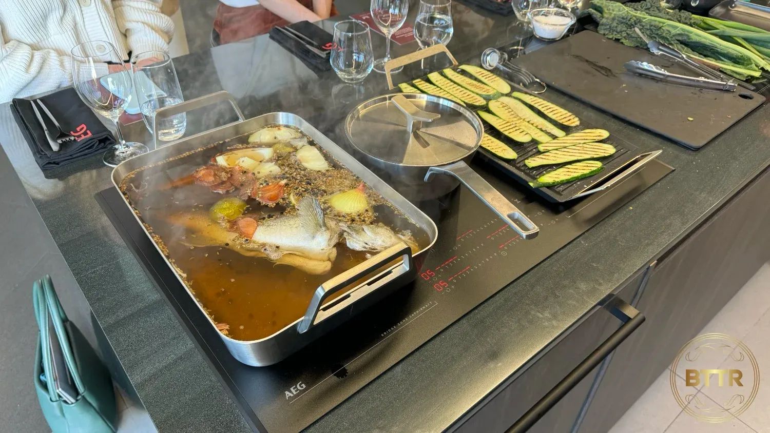 The AEG SapphirMatt poaching fish, grilling zucchini and cooking rhubarb 