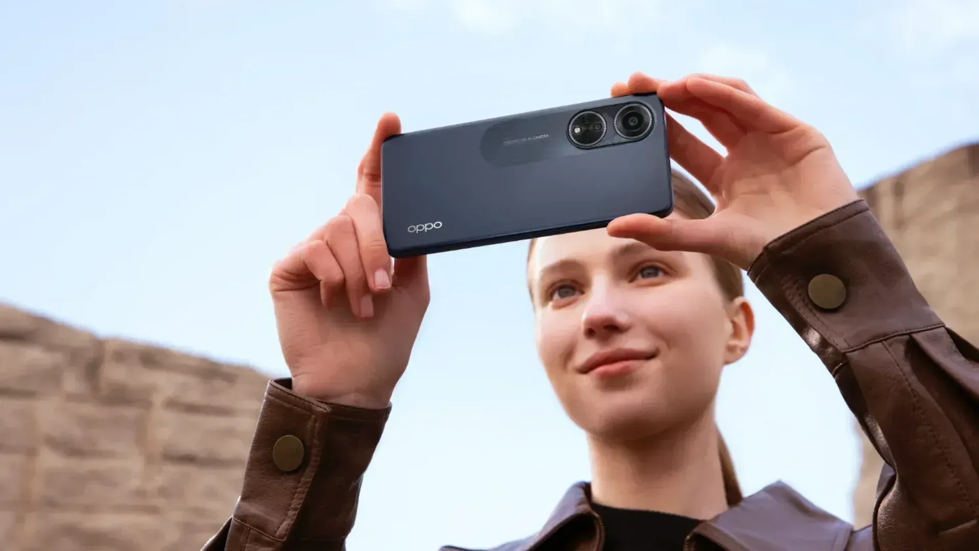 Oppo A98 5G launch shows a woman taking a photo with the phone