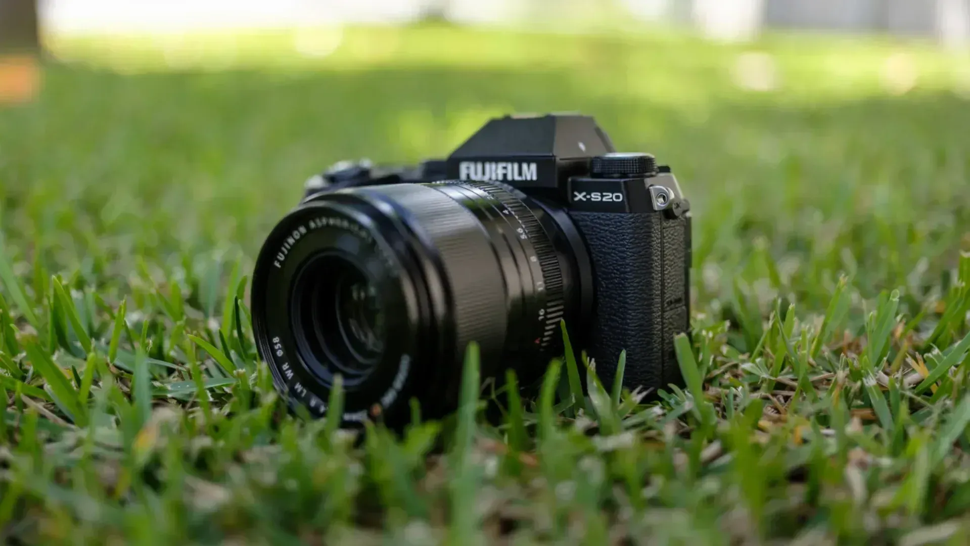 The Fujifilm X-s20 sitting in grass