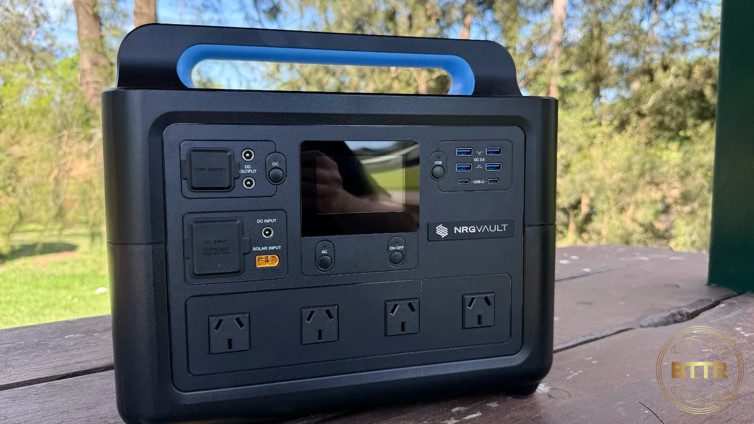 The NRGVault PV1500 on a picnic table by a river