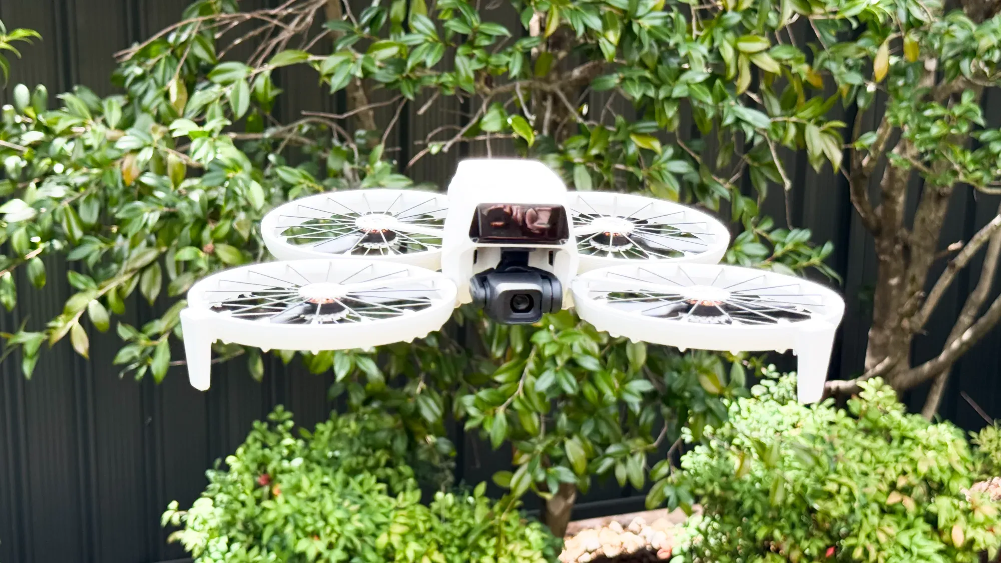 The DJI Flip hovering in front of me after I unboxed it.