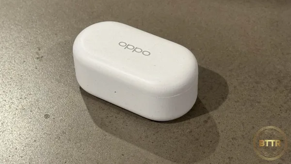 Oppo Enco Buds 2 case on a concrete table