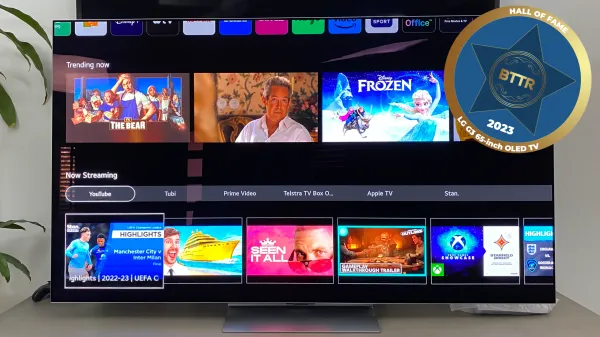 The LG G3 TV set up on the stand for review with the Hall of Fame badge overlaid.
