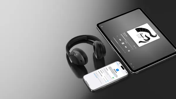 An image of Belkin's new headphones with an iPhone and iPad