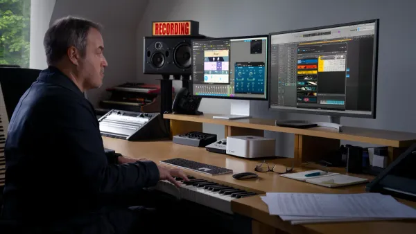 A man making music with the Mac Studio