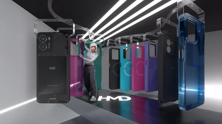 A stylised photo of the HMD Fusion on a clothes rack with a woman and a range of Outfits for the phone.